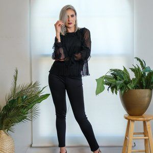 Straight leg mid-rise trouser.